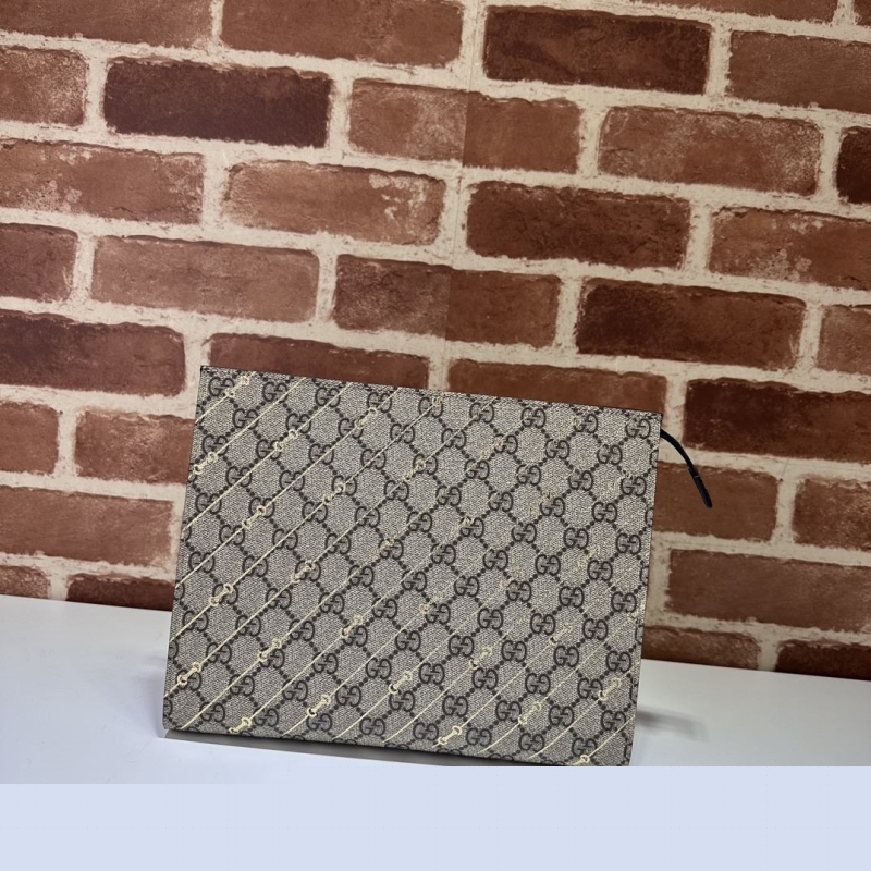 G*u*i clutch bags